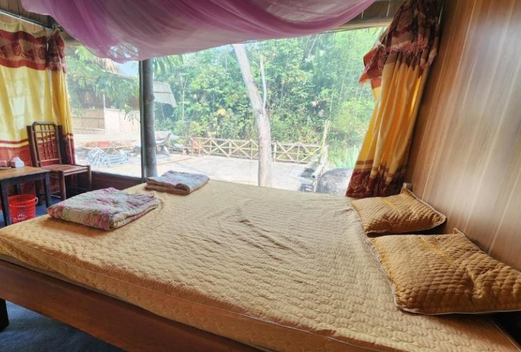 Confort et tradition dans une chambre au Dong Que Homestay
