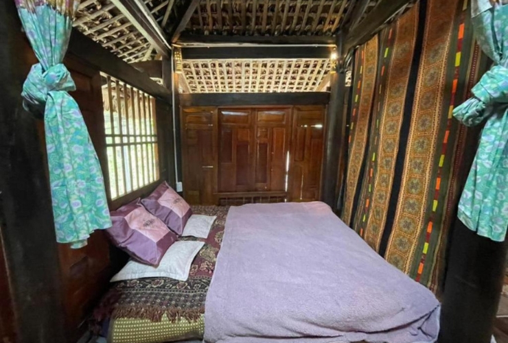 Une nuit paisible à Nha La Homestay, au cœur du village de Tha
