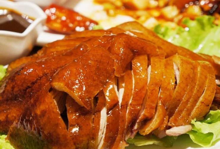 Canard laqué, le plat emblématique du quartier chinois Saigon